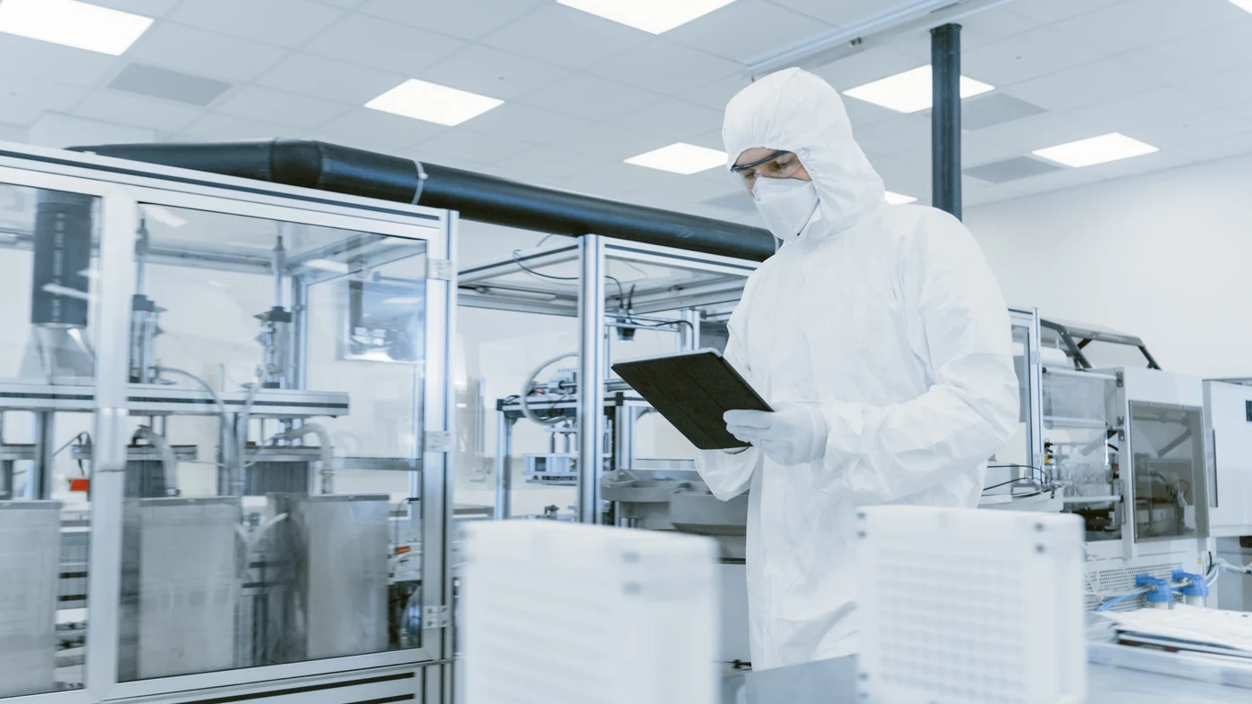 Laboratory professional reviewing quality control